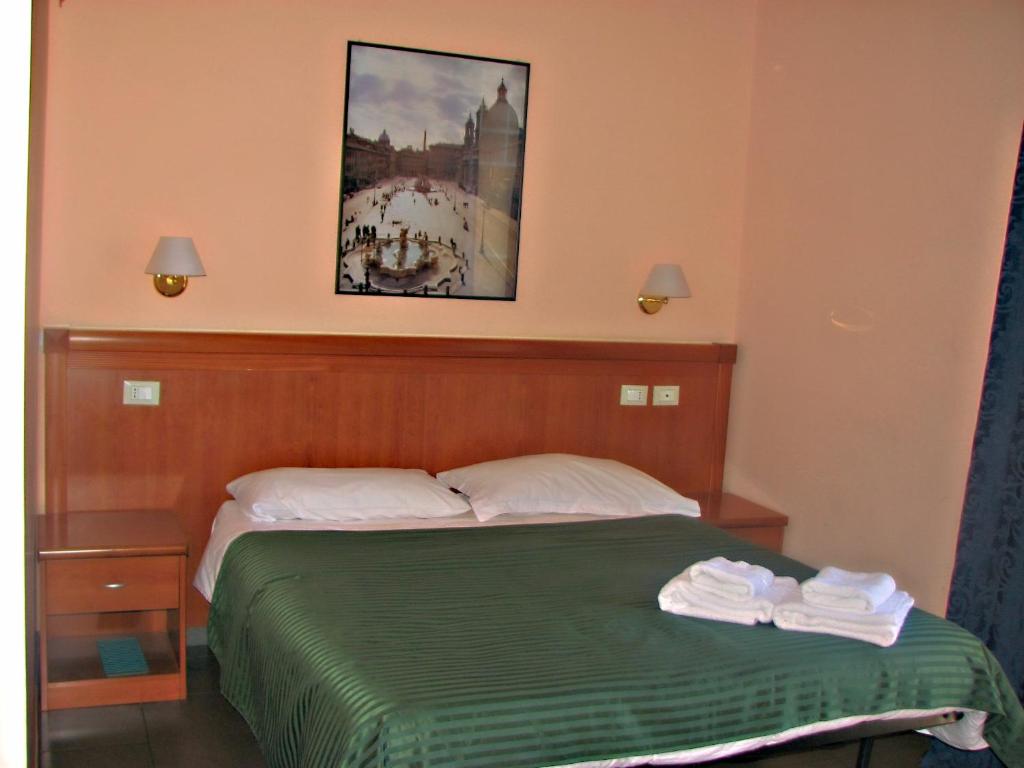 Uma cama ou camas num quarto em Palma