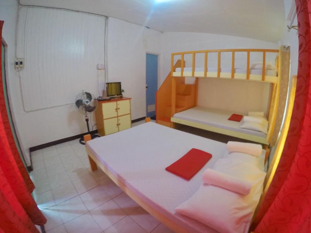 Postel nebo postele na pokoji v ubytování The BIGGIES Inn
