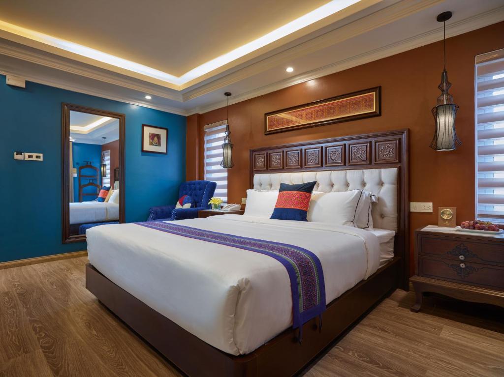 Giường trong phòng chung tại Eden Boutique Hotel & Spa