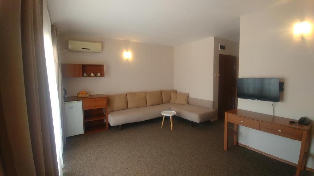 TV a/nebo společenská místnost v ubytování Family Hotel Muses