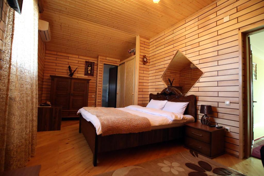 Postel nebo postele na pokoji v ubytování Hotel Harmony