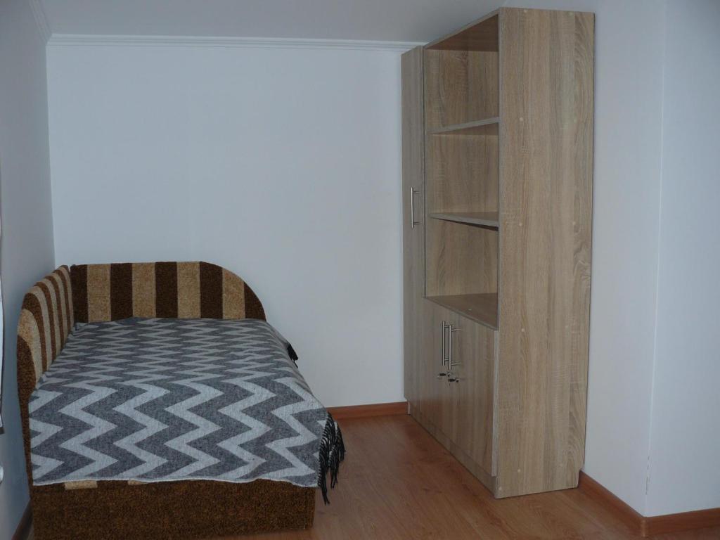 Postel nebo postele na pokoji v ubytování Hostynnyi Botsiun
