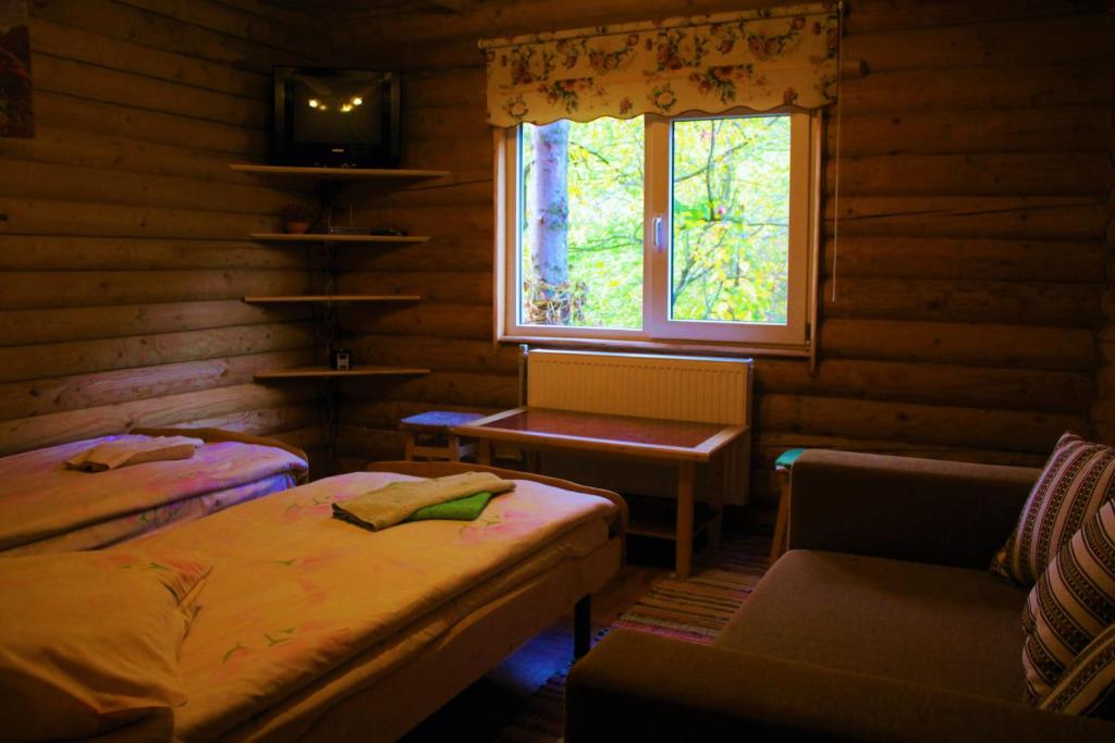 Postel nebo postele na pokoji v ubytování "LiAn" Family Hotel & Restaurant
