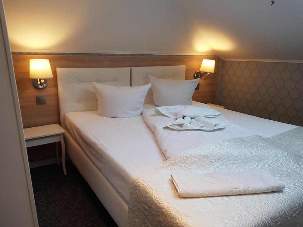 Posteľ alebo postele v izbe v ubytovaní Motelik Lord