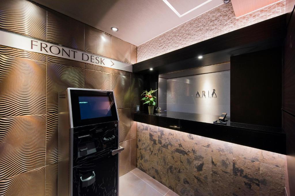 TV a/nebo společenská místnost v ubytování Hotel Aria(Adult Only)