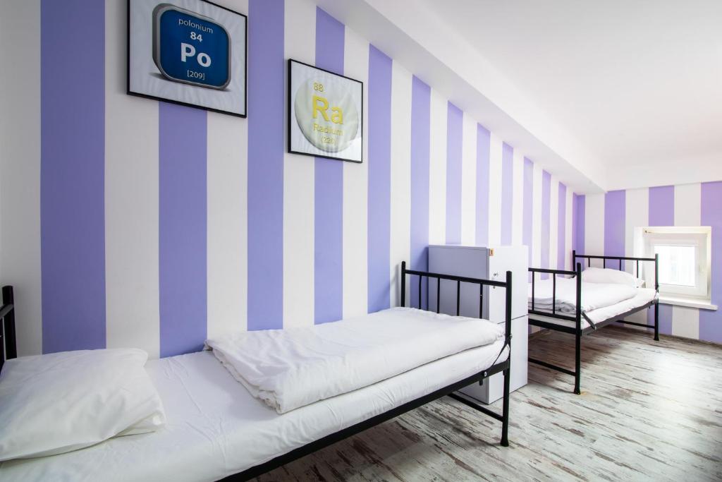 Postel nebo postele na pokoji v ubytování AB Hostel