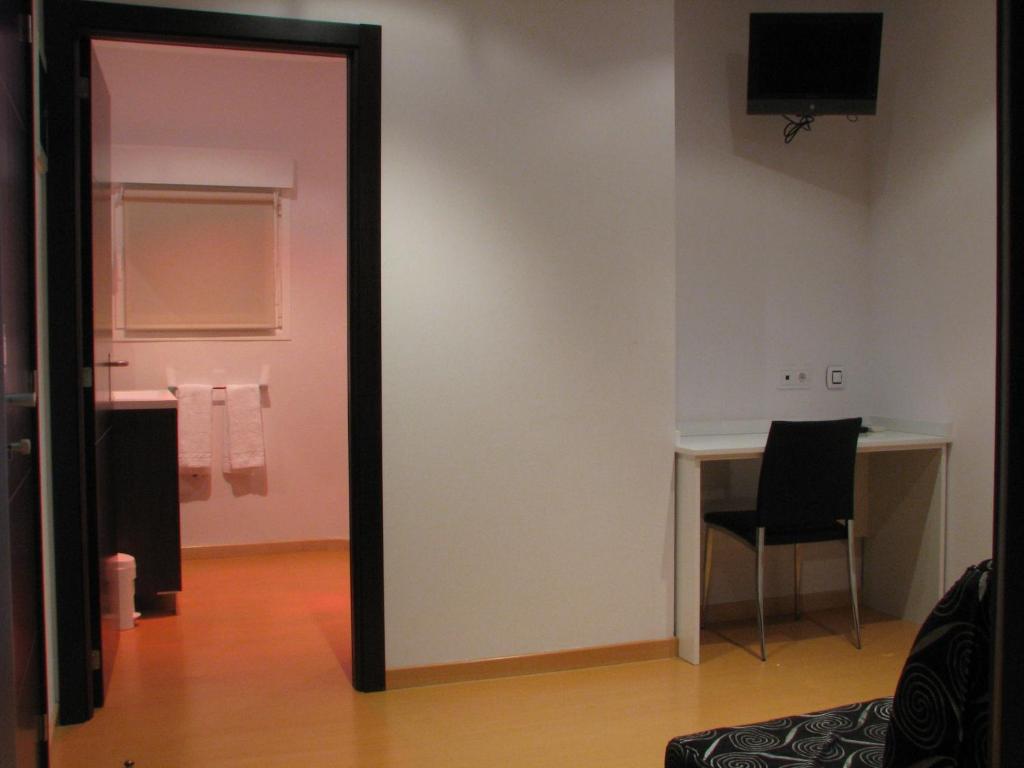 TV a/nebo společenská místnost v ubytování Hotel Elizalde
