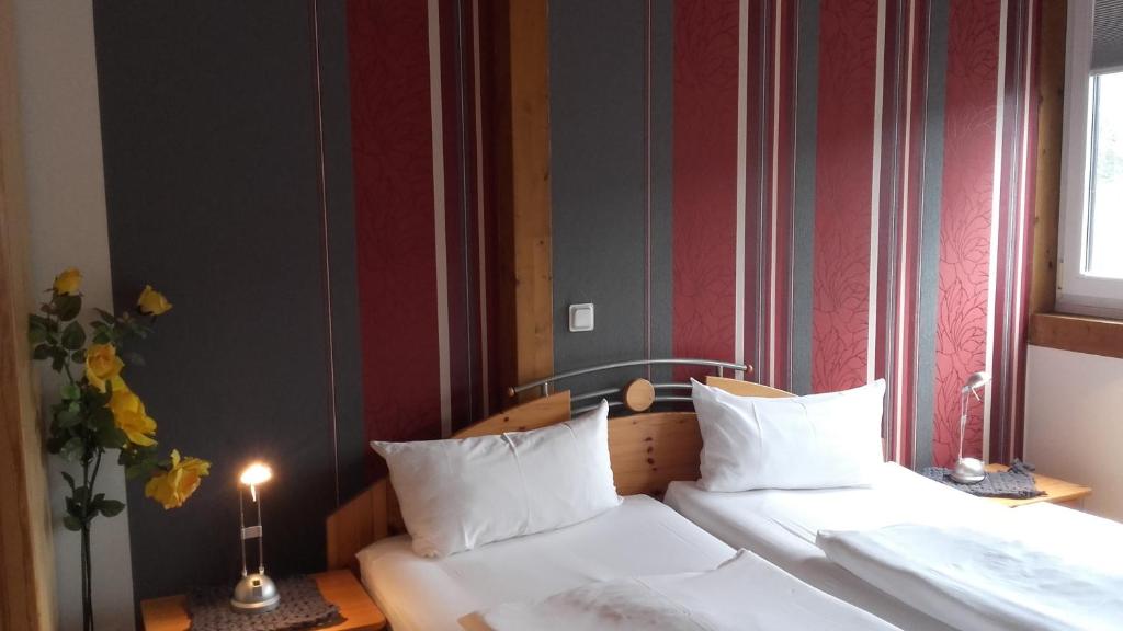 Postel nebo postele na pokoji v ubytování Gästehaus Moselblick