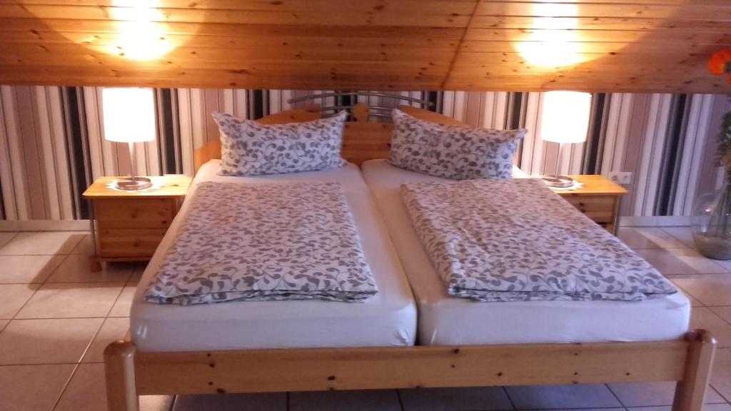 Postel nebo postele na pokoji v ubytování Gästehaus Moselblick