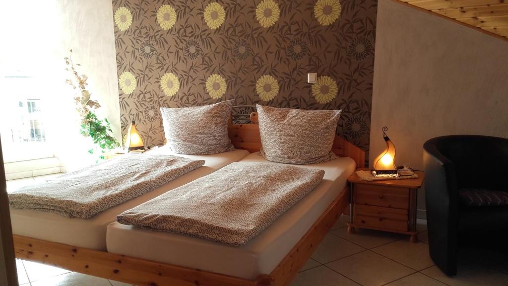 Postel nebo postele na pokoji v ubytování Gästehaus Moselblick