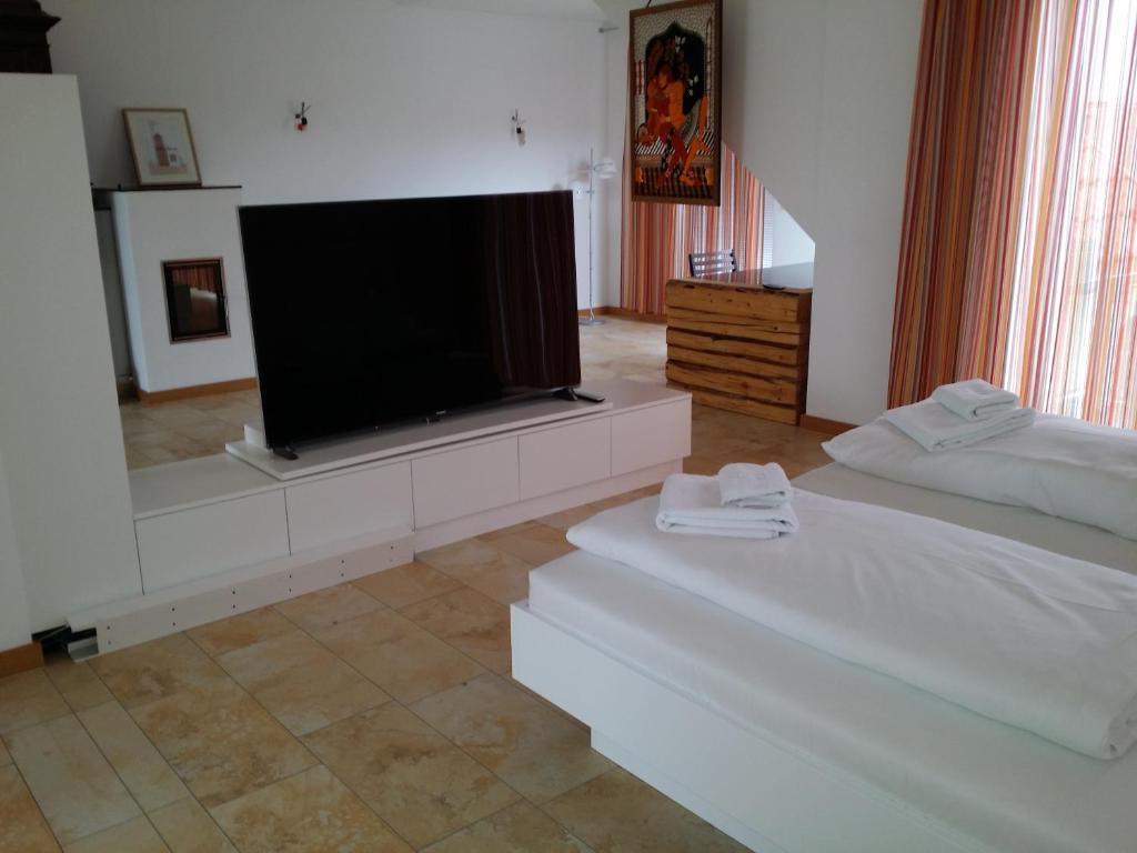 Postel nebo postele na pokoji v ubytování Hotel Aton