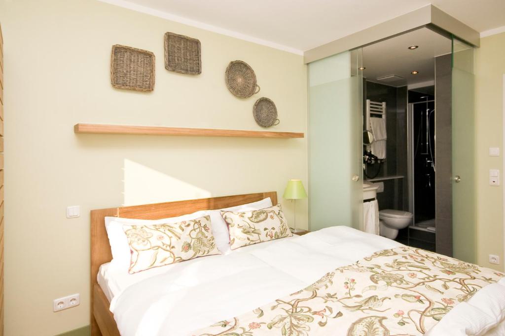Postel nebo postele na pokoji v ubytování Hotel Viva Sky