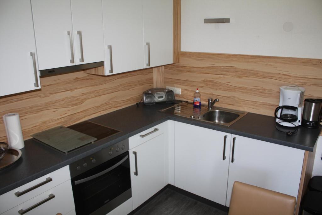 Kuchyň nebo kuchyňský kout v ubytování Haus Berta