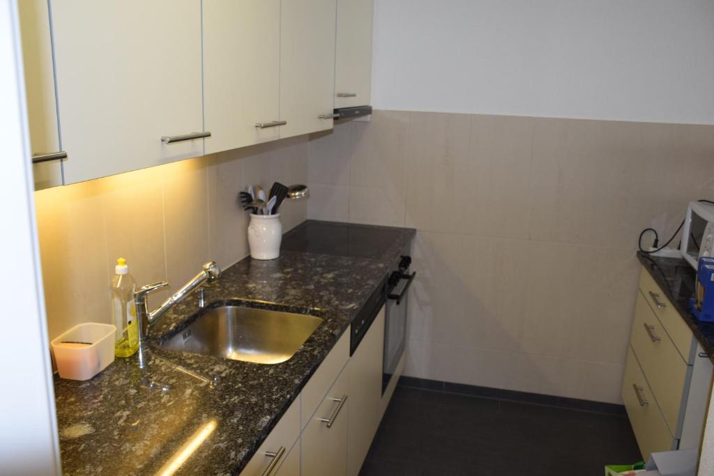 Kuchyň nebo kuchyňský kout v ubytování Apartment Zermatt - perfect location