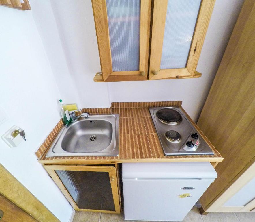 Kuchyňa alebo kuchynka v ubytovaní Amorani Studios