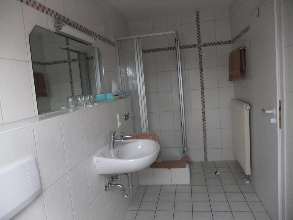 Koupelna v ubytování Hotel Garni Classico