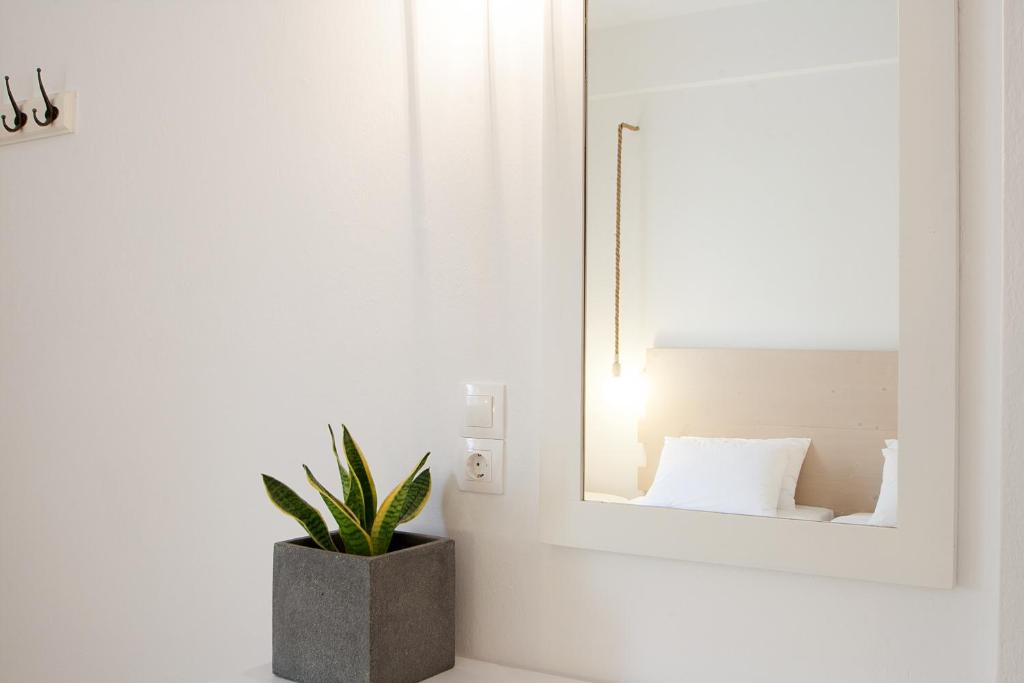 Un ou plusieurs lits dans un hébergement de l'établissement Paris Studios & Apartment