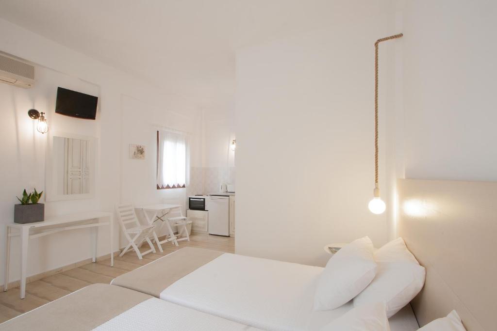 Un ou plusieurs lits dans un hébergement de l'établissement Paris Studios & Apartment