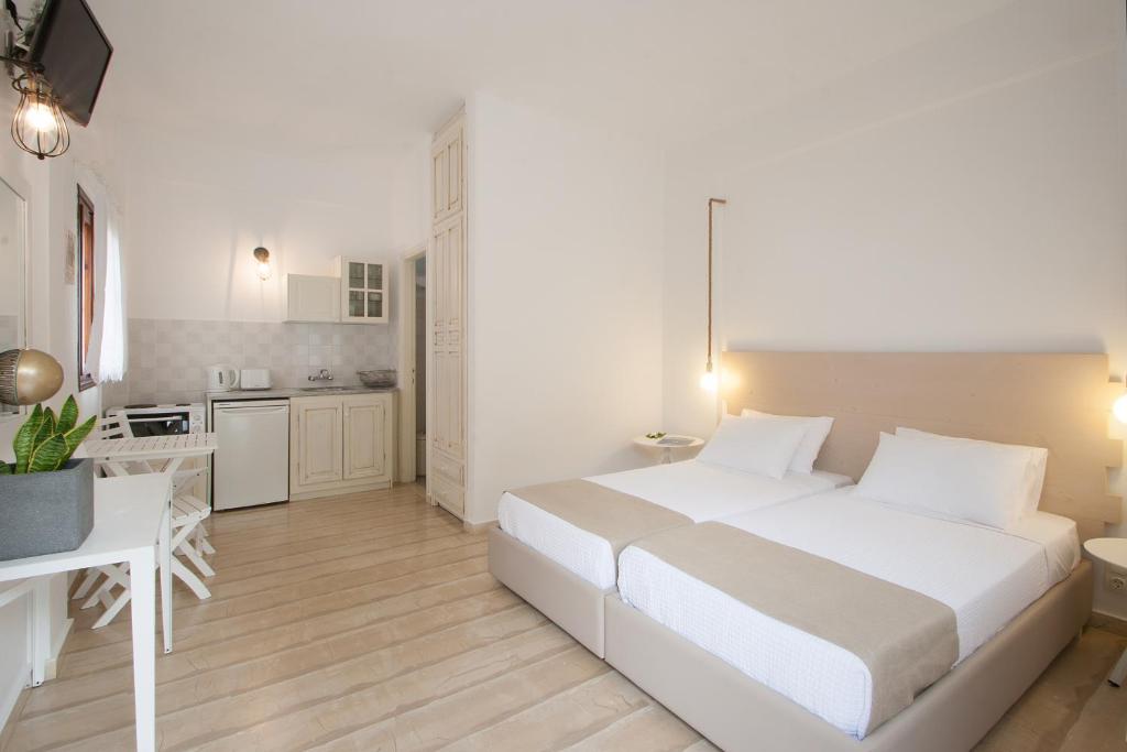 Un ou plusieurs lits dans un hébergement de l'établissement Paris Studios & Apartment