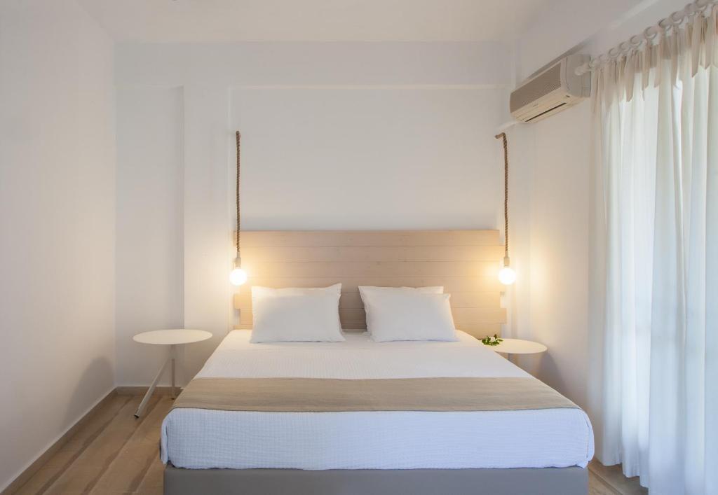 Un ou plusieurs lits dans un hébergement de l'établissement Paris Studios & Apartment