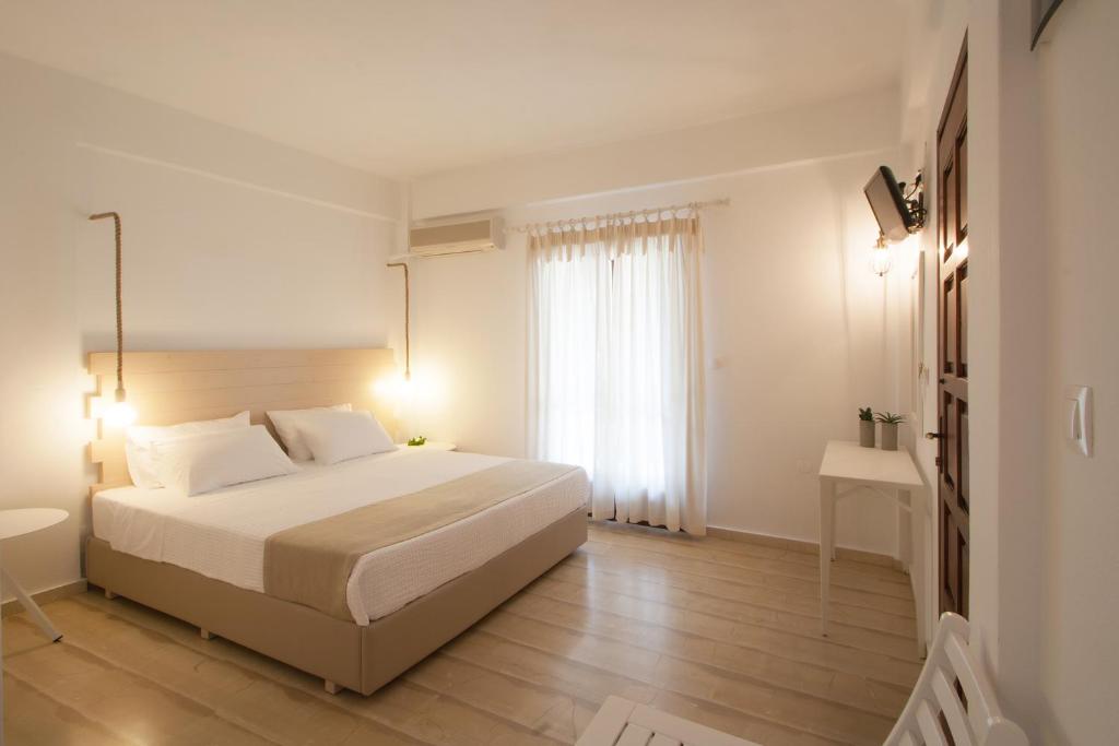 Un ou plusieurs lits dans un hébergement de l'établissement Paris Studios & Apartment