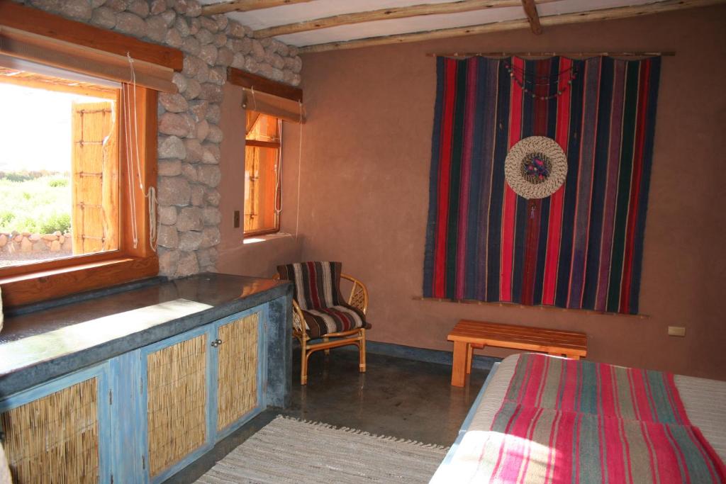 Postel nebo postele na pokoji v ubytování Casita La Brea