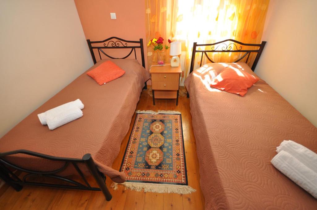 Postel nebo postele na pokoji v ubytování Villa Makrades