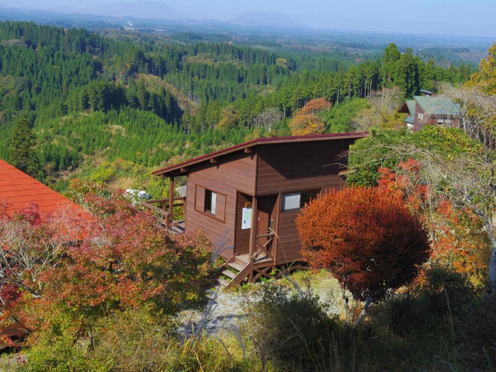 a small cabin in the middle of a forest at Gokase Campsite Camping and Guesthouse in Gokase