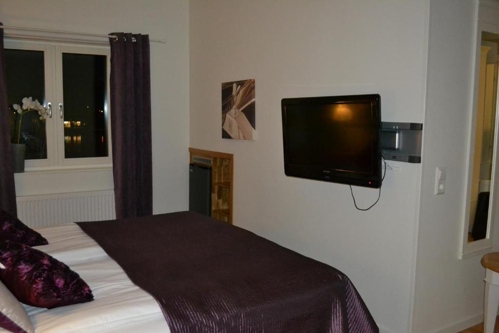 TV a/nebo společenská místnost v ubytování Hotell Nostalgi