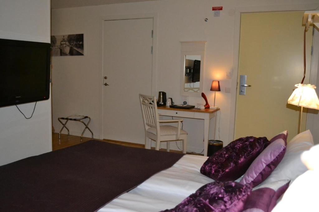 TV a/nebo společenská místnost v ubytování Hotell Nostalgi