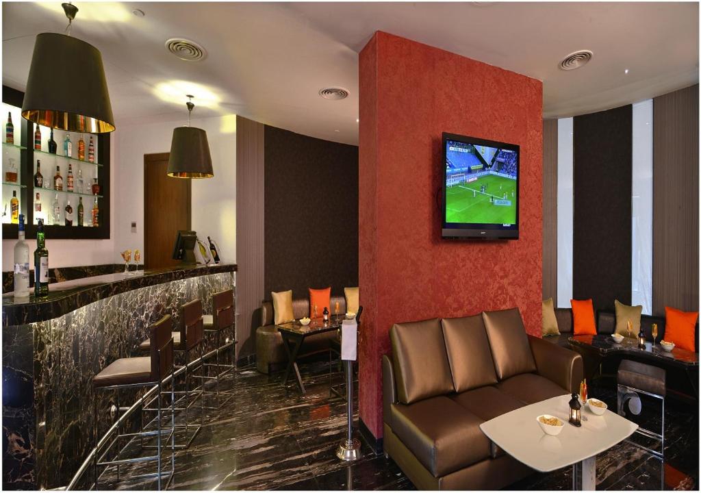 TV a/nebo společenská místnost v ubytování Fortune Park Sishmo, Bhubaneswar - Member ITC Hotels' Group