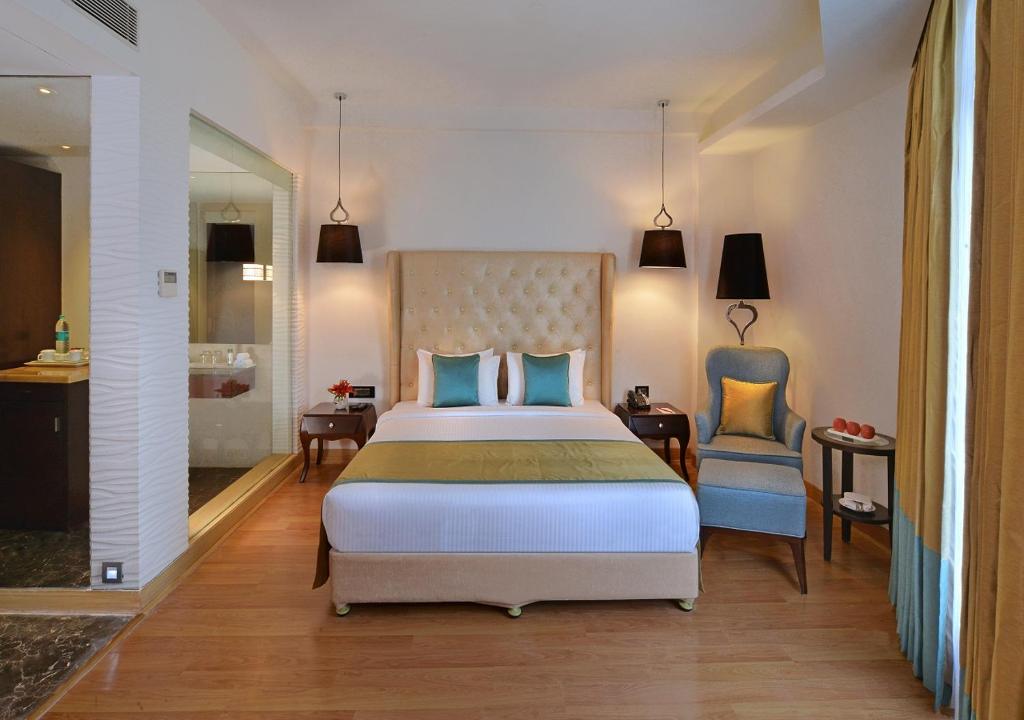 Postel nebo postele na pokoji v ubytování Fortune Park Sishmo, Bhubaneswar - Member ITC Hotels' Group