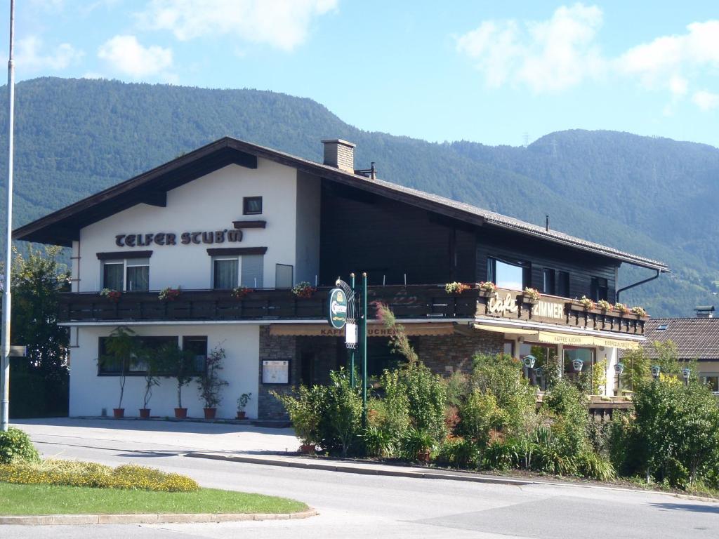 a building on the side of a road at Telfer Stubm in Telfs