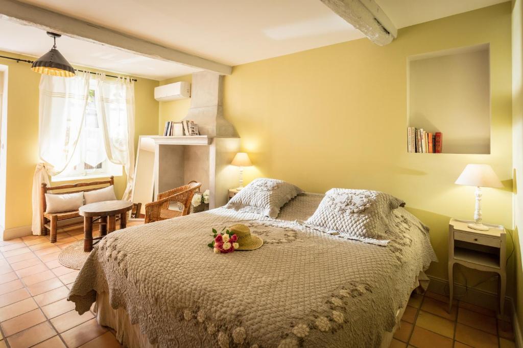 Postel nebo postele na pokoji v ubytování Château le Bouïs