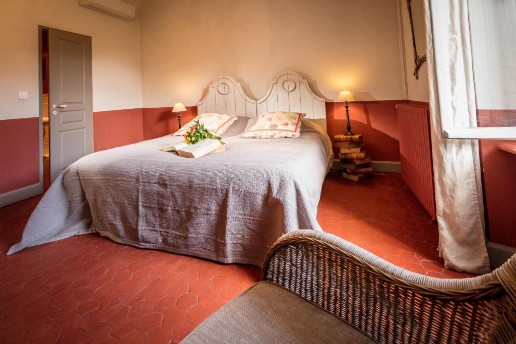 Postel nebo postele na pokoji v ubytování Château le Bouïs