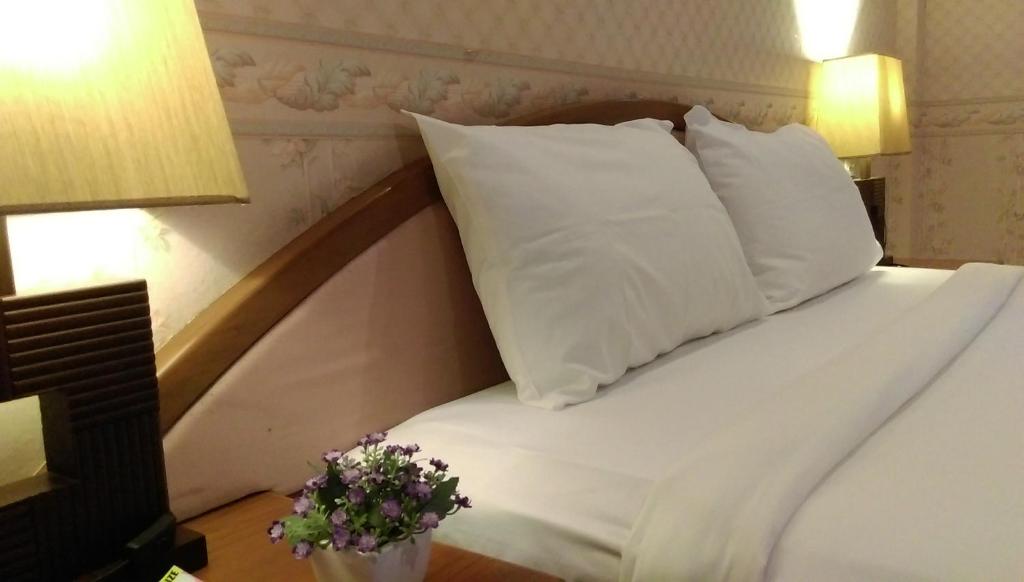 Postel nebo postele na pokoji v ubytování Salsa Hostel