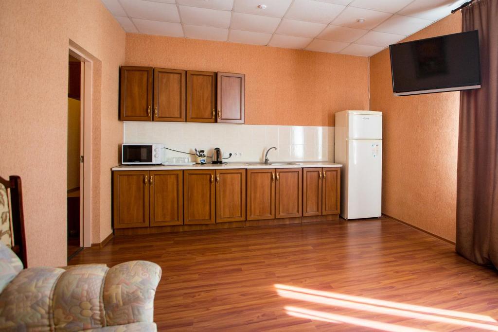 Kuchyň nebo kuchyňský kout v ubytování Art Hotel