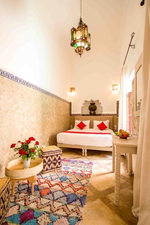 Postel nebo postele na pokoji v ubytování Riad Amira