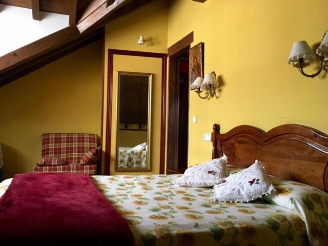 Posteľ alebo postele v izbe v ubytovaní Posada La Casona De Ucieda