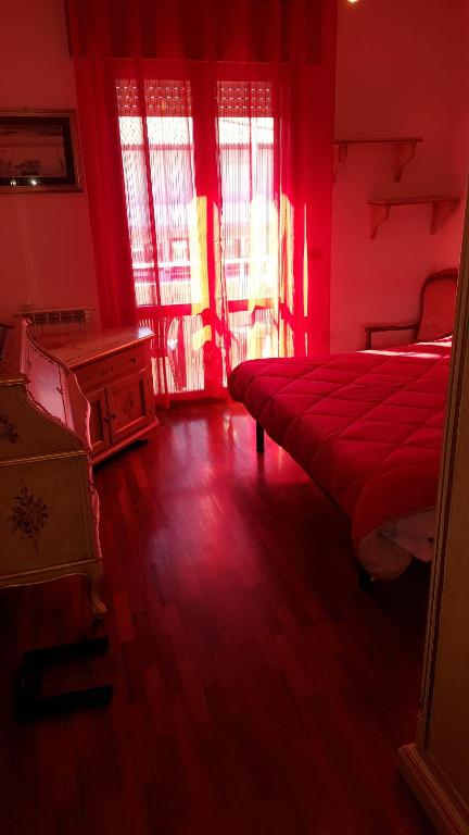 Postel nebo postele na pokoji v ubytování B&B Verrazzano affittacamere