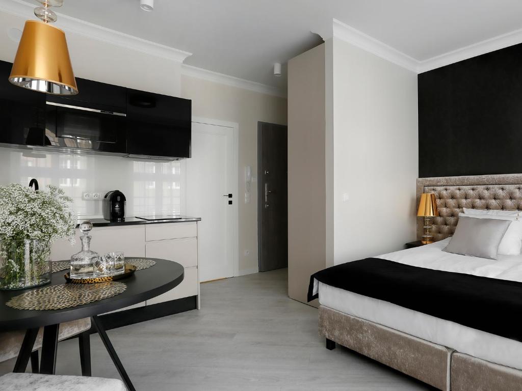 Postel nebo postele na pokoji v ubytování Lavoo Boutique Apartments