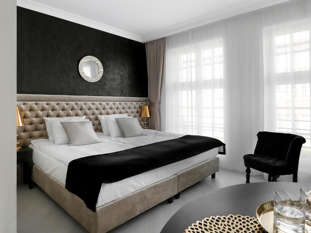 Postel nebo postele na pokoji v ubytování Lavoo Boutique Apartments