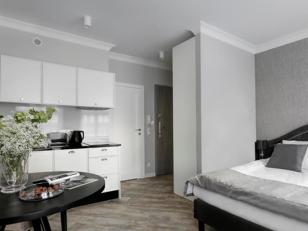 Kuchyň nebo kuchyňský kout v ubytování Lavoo Boutique Apartments