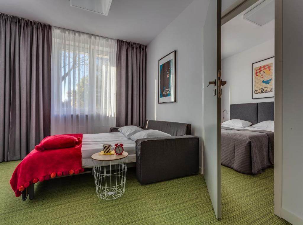 Posteľ alebo postele v izbe v ubytovaní B&B Julinek Park