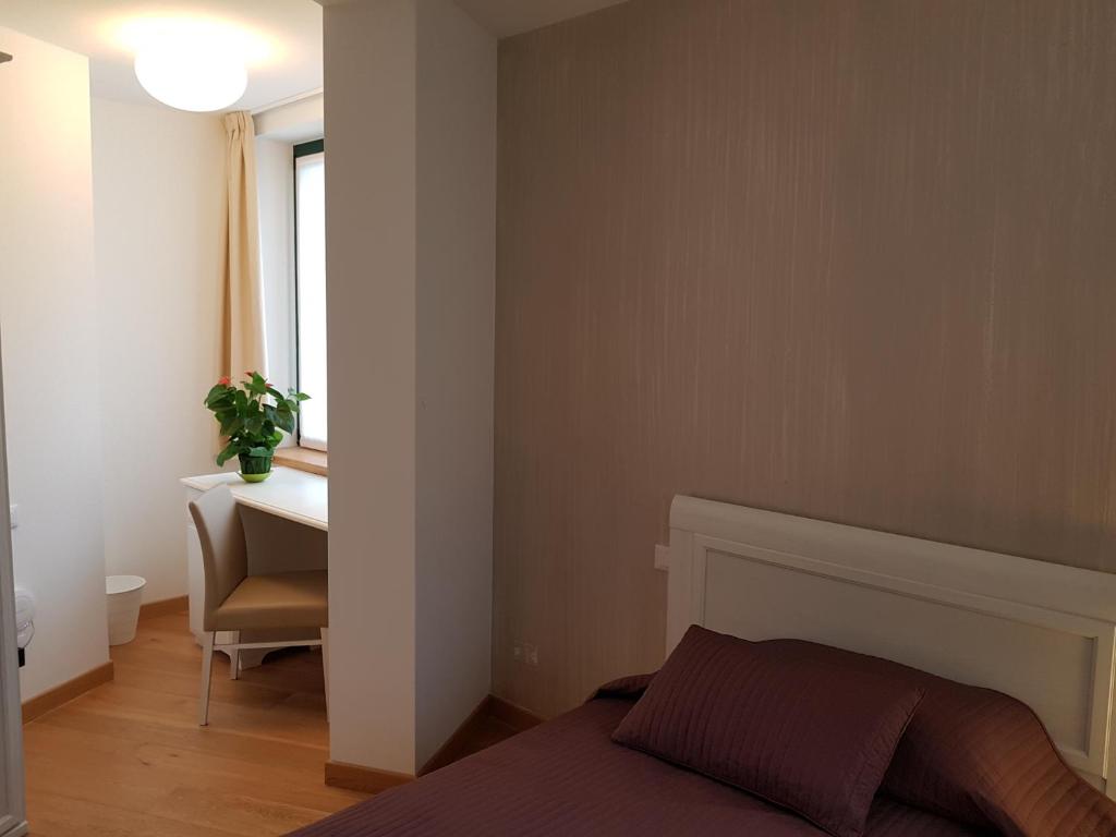Postel nebo postele na pokoji v ubytování I Personaggi
