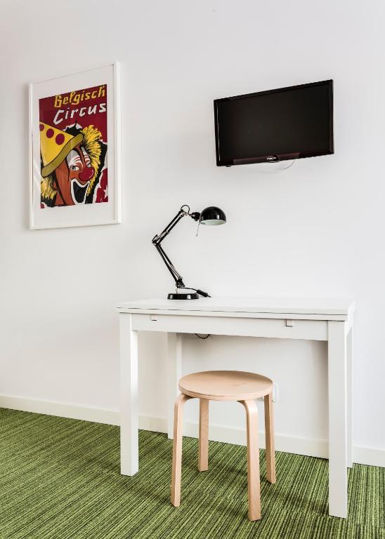 Televízia a/alebo spoločenská miestnosť v ubytovaní B&B Julinek Park