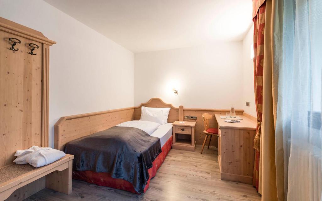 Postel nebo postele na pokoji v ubytování Villa Tony - Small Romantic Hotel