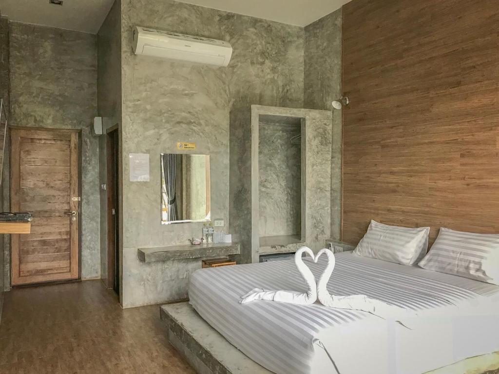 Postel nebo postele na pokoji v ubytování Alinda Resort
