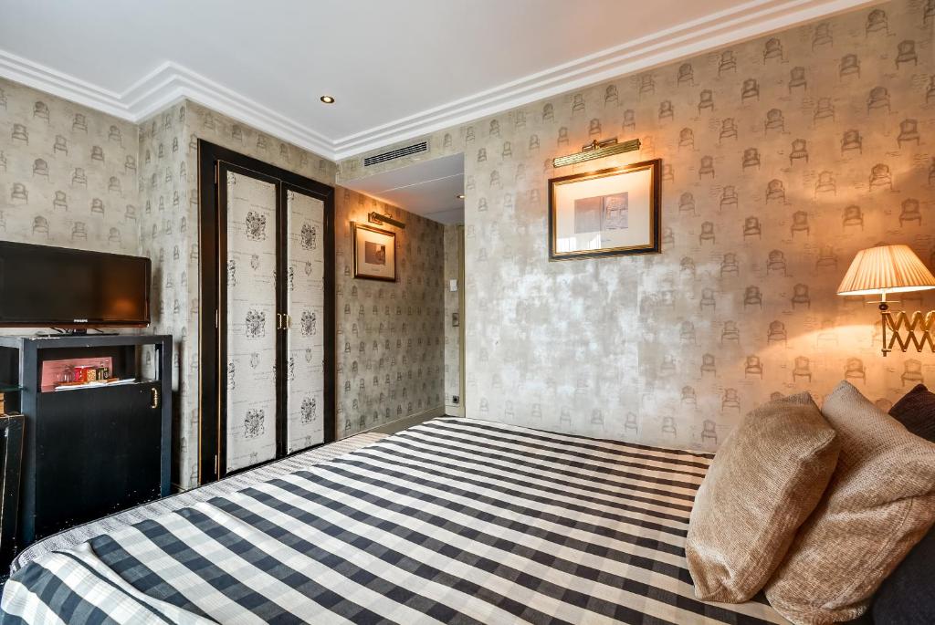 Voodi või voodid majutusasutuse Villa Lutèce Port Royal toas