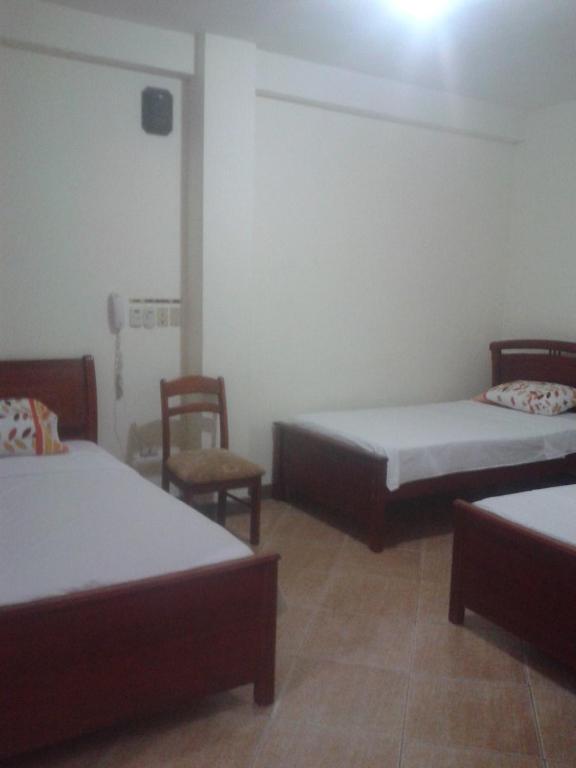 Postel nebo postele na pokoji v ubytování Hotel Murcia